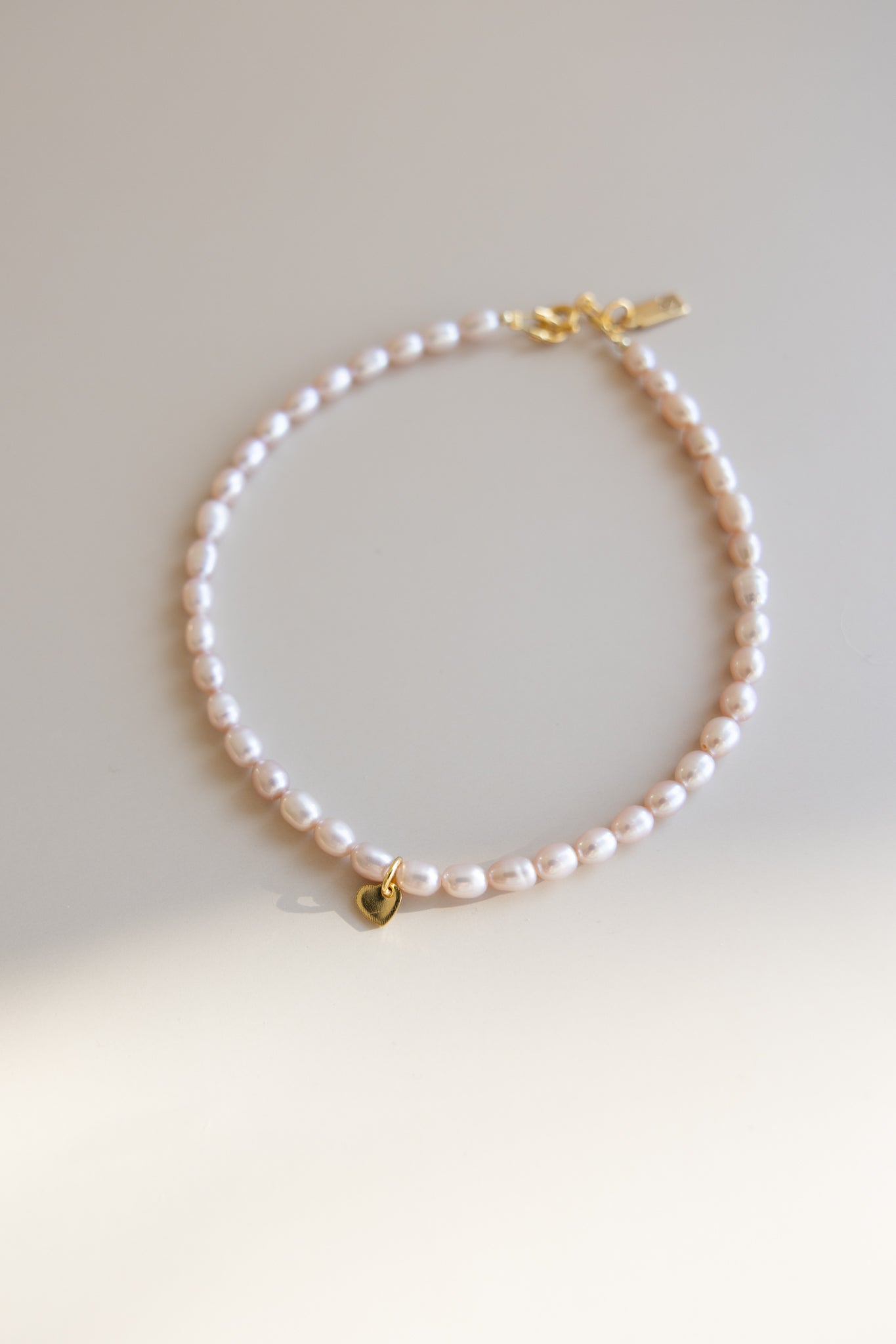 Baby + Kid Pink Pearl Necklace + Gold Heart Charm